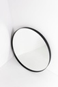 Round mirror set back in black frame — view 3